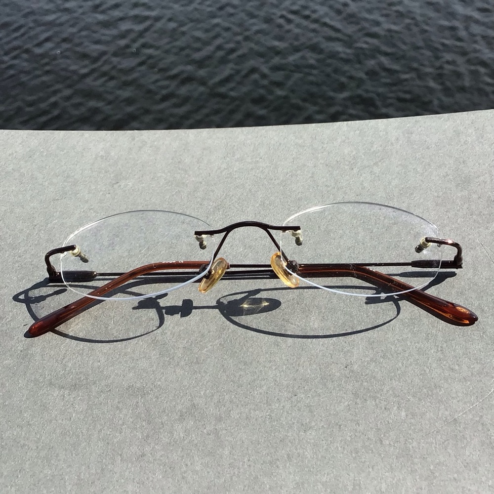 Edgē Rimless Oval Eyeglasses with Orange Temples ED7311